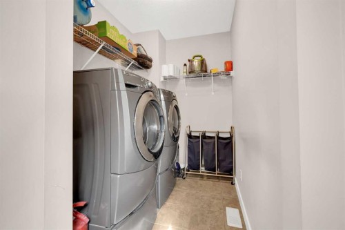 88 Silverado Saddle Avenue Sw, Calgary, AB - Indoor Photo Showing Laundry Room