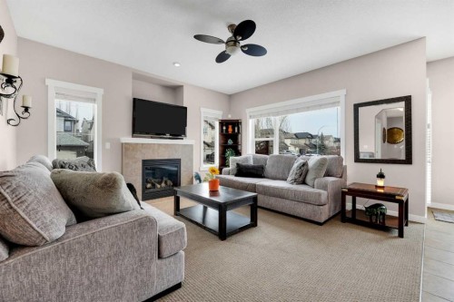 88 Silverado Saddle Avenue Sw, Calgary, AB - Indoor Photo Showing Living Room With Fireplace