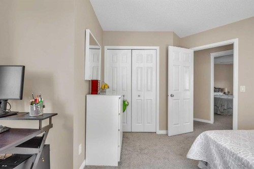320 Evermeadow Road Sw, Calgary, AB - Indoor Photo Showing Bedroom