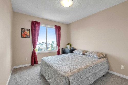 320 Evermeadow Road Sw, Calgary, AB - Indoor Photo Showing Bedroom