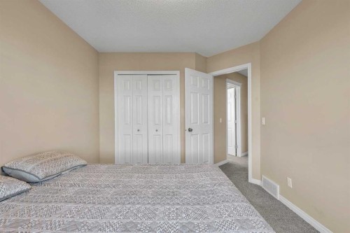 320 Evermeadow Road Sw, Calgary, AB - Indoor Photo Showing Bedroom