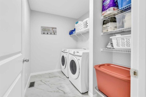 312 Edith Place Nw, Calgary, AB - Indoor Photo Showing Laundry Room