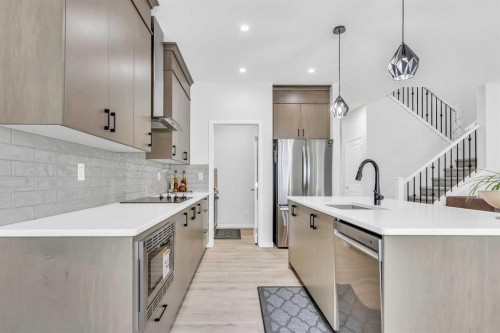 312 Edith Place Nw, Calgary, AB - Indoor Photo Showing Kitchen With Upgraded Kitchen