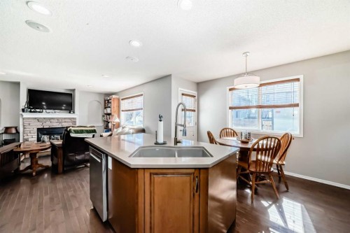 377 Cimarron Boulevard, Okotoks, AB - Indoor Photo Showing Kitchen With Double Sink