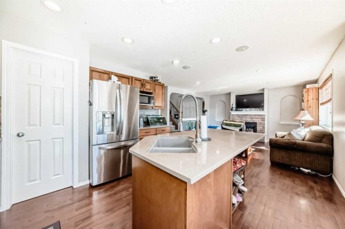 377 Cimarron Boulevard, Okotoks, AB - Indoor Photo Showing Kitchen With Double Sink