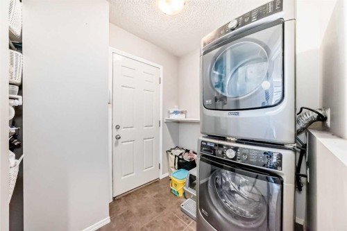 377 Cimarron Boulevard, Okotoks, AB - Indoor Photo Showing Laundry Room