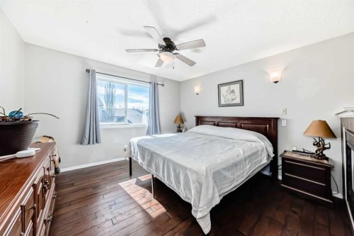 377 Cimarron Boulevard, Okotoks, AB - Indoor Photo Showing Bedroom