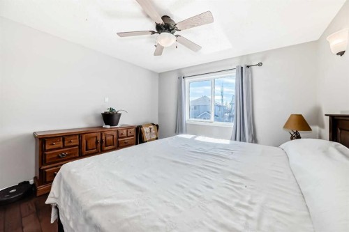 377 Cimarron Boulevard, Okotoks, AB - Indoor Photo Showing Bedroom