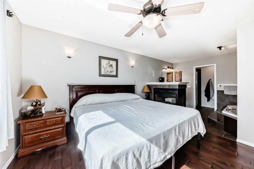 377 Cimarron Boulevard, Okotoks, AB - Indoor Photo Showing Bedroom