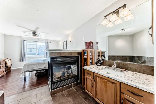 377 Cimarron Boulevard, Okotoks, AB - Indoor With Fireplace