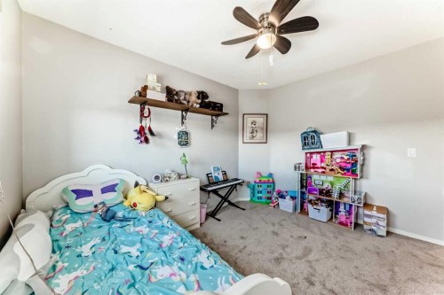 377 Cimarron Boulevard, Okotoks, AB - Indoor Photo Showing Bedroom