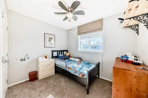 377 Cimarron Boulevard, Okotoks, AB - Indoor Photo Showing Bedroom