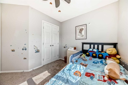 377 Cimarron Boulevard, Okotoks, AB - Indoor Photo Showing Bedroom
