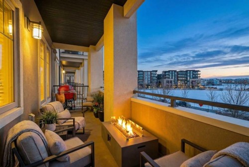 214-140 Mahogany Street Se, Calgary, AB - Outdoor With Body Of Water With Balcony