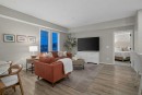 214-140 Mahogany Street Se, Calgary, AB  - Indoor Photo Showing Living Room 