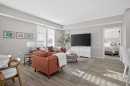 214-140 Mahogany Street Se, Calgary, AB  - Indoor Photo Showing Living Room 