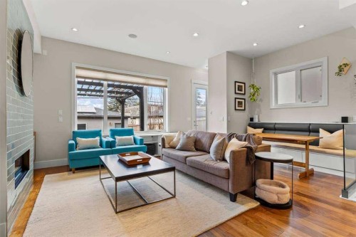 4128 7 Avenue Sw, Calgary, AB - Indoor Photo Showing Living Room With Fireplace