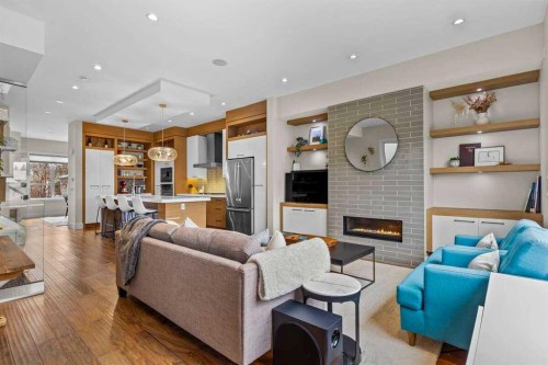 4128 7 Avenue Sw, Calgary, AB - Indoor Photo Showing Living Room With Fireplace