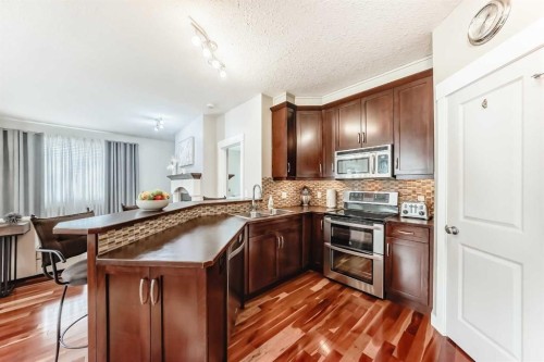 160 Sienna Passage, Chestermere, AB - Indoor Photo Showing Kitchen With Upgraded Kitchen