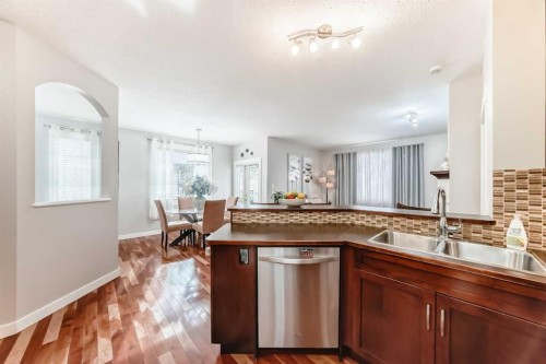160 Sienna Passage, Chestermere, AB - Indoor Photo Showing Kitchen With Double Sink
