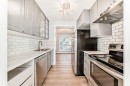 161-6915 Ranchview Drive Nw, Calgary, AB  - Indoor Photo Showing Kitchen With Double Sink 