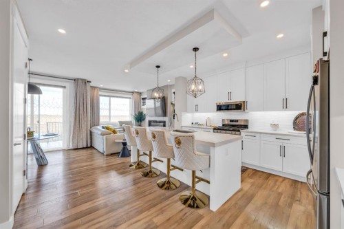 163 Sandpiper Bend, Chestermere, AB - Indoor Photo Showing Kitchen With Upgraded Kitchen