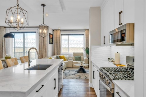 163 Sandpiper Bend, Chestermere, AB - Indoor Photo Showing Kitchen With Upgraded Kitchen