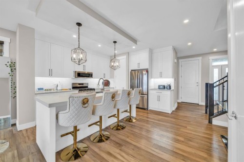 163 Sandpiper Bend, Chestermere, AB - Indoor Photo Showing Kitchen With Stainless Steel Kitchen With Upgraded Kitchen