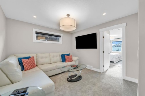 163 Sandpiper Bend, Chestermere, AB - Indoor Photo Showing Living Room