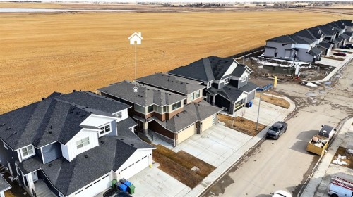 163 Sandpiper Bend, Chestermere, AB - Outdoor With Body Of Water