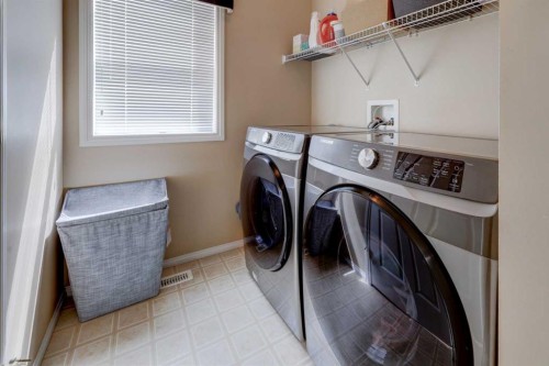 22 Tarington Landing Ne, Calgary, AB - Indoor Photo Showing Laundry Room