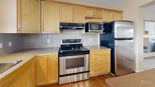 95 Covepark Place Ne, Calgary, AB - Indoor Photo Showing Kitchen
