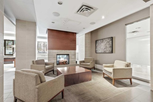 317-222 Riverfront Avenue Sw, Calgary, AB - Indoor With Fireplace