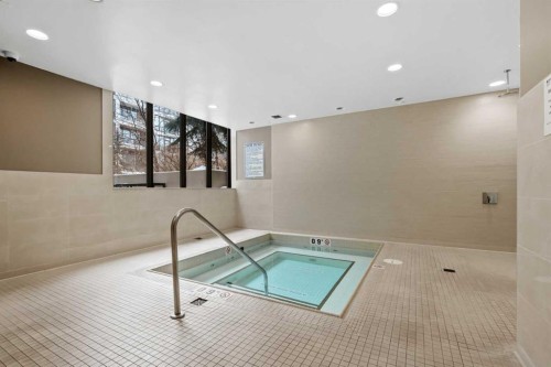 317-222 Riverfront Avenue Sw, Calgary, AB - Indoor Photo Showing Other Room With In Ground Pool