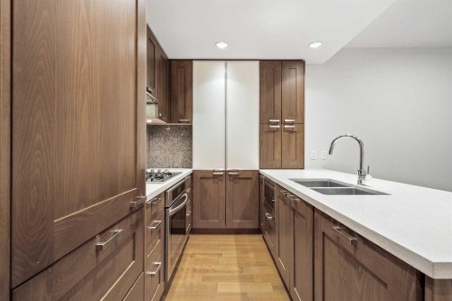 317-222 Riverfront Avenue Sw, Calgary, AB - Indoor Photo Showing Kitchen With Double Sink With Upgraded Kitchen