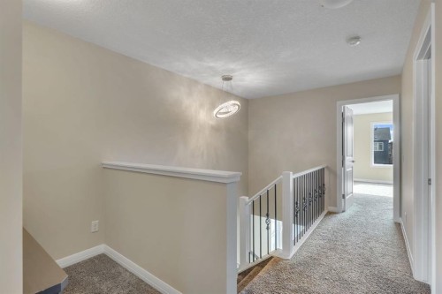 289 Cornerstone Passage Ne, Calgary, AB - Indoor Photo Showing Other Room