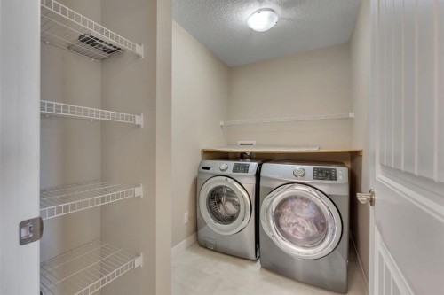 289 Cornerstone Passage Ne, Calgary, AB - Indoor Photo Showing Laundry Room