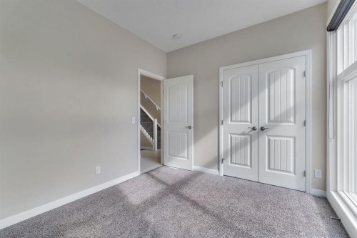 289 Cornerstone Passage Ne, Calgary, AB - Indoor Photo Showing Other Room