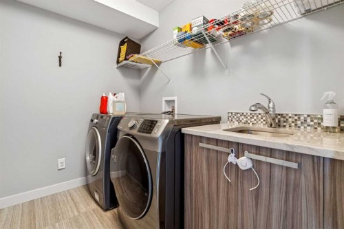 127 34 Street Nw, Calgary, AB - Indoor Photo Showing Laundry Room