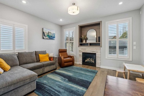 127 34 Street Nw, Calgary, AB - Indoor Photo Showing Living Room With Fireplace