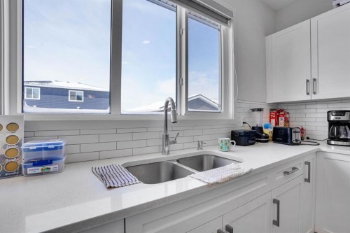 137 Seton Villas Se, Calgary, AB - Indoor Photo Showing Kitchen With Double Sink