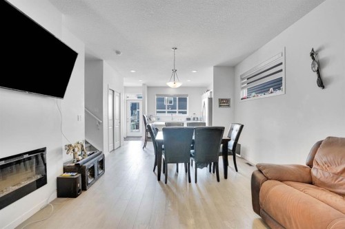 137 Seton Villas Se, Calgary, AB - Indoor With Fireplace