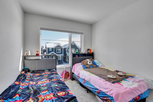 137 Seton Villas Se, Calgary, AB - Indoor Photo Showing Bedroom