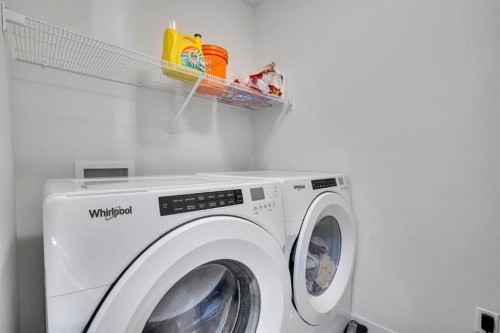 137 Seton Villas Se, Calgary, AB - Indoor Photo Showing Laundry Room