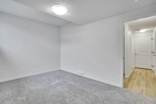 137 Seton Villas Se, Calgary, AB - Indoor Photo Showing Other Room