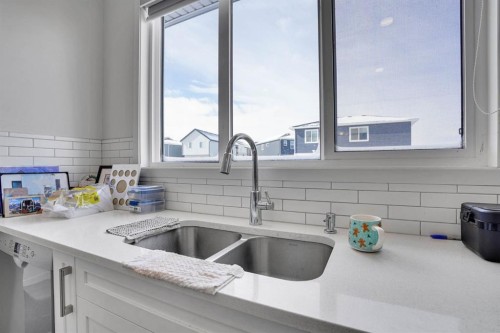 137 Seton Villas Se, Calgary, AB - Indoor Photo Showing Kitchen With Double Sink