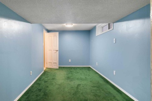 16 Midridge Gardens Se, Calgary, AB - Indoor Photo Showing Other Room