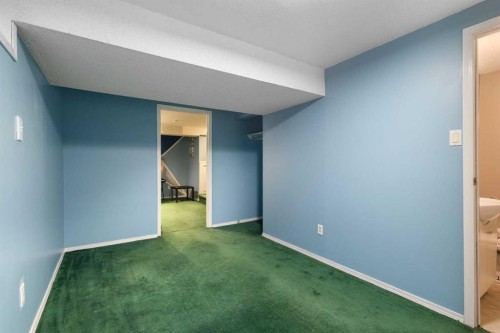 16 Midridge Gardens Se, Calgary, AB - Indoor Photo Showing Other Room