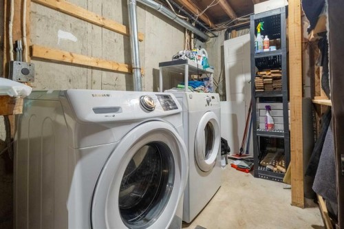 16 Midridge Gardens Se, Calgary, AB - Indoor Photo Showing Laundry Room
