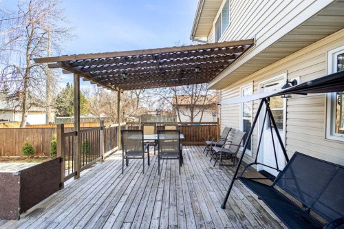 16 Midridge Gardens Se, Calgary, AB - Outdoor With Deck Patio Veranda With Exterior